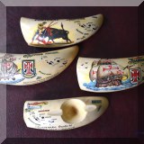 C05. Vintage scrimshawed whale's teeth. 